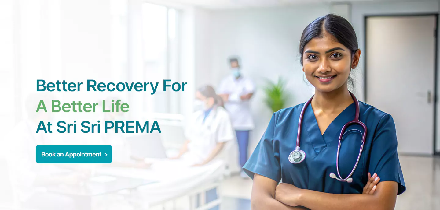 Smiling nurse in a hospital setting, promoting better recovery at Sri Sri PREMA.